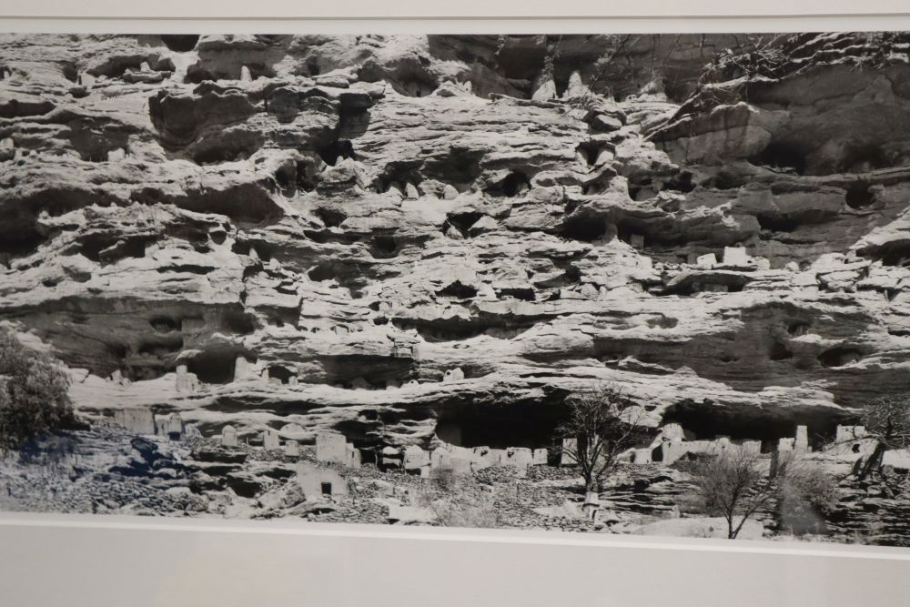A collection of eight contemporary photographs of Olympians, approximately 40 x 58cm and two other black and white photographs